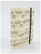 Krém színű, kottamintás notesz